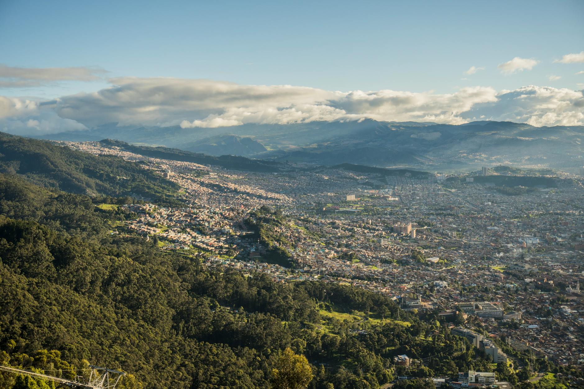 Bogota cityscape at warm afternoon light, representing the Expo Mobile Colombia 2026 venue.