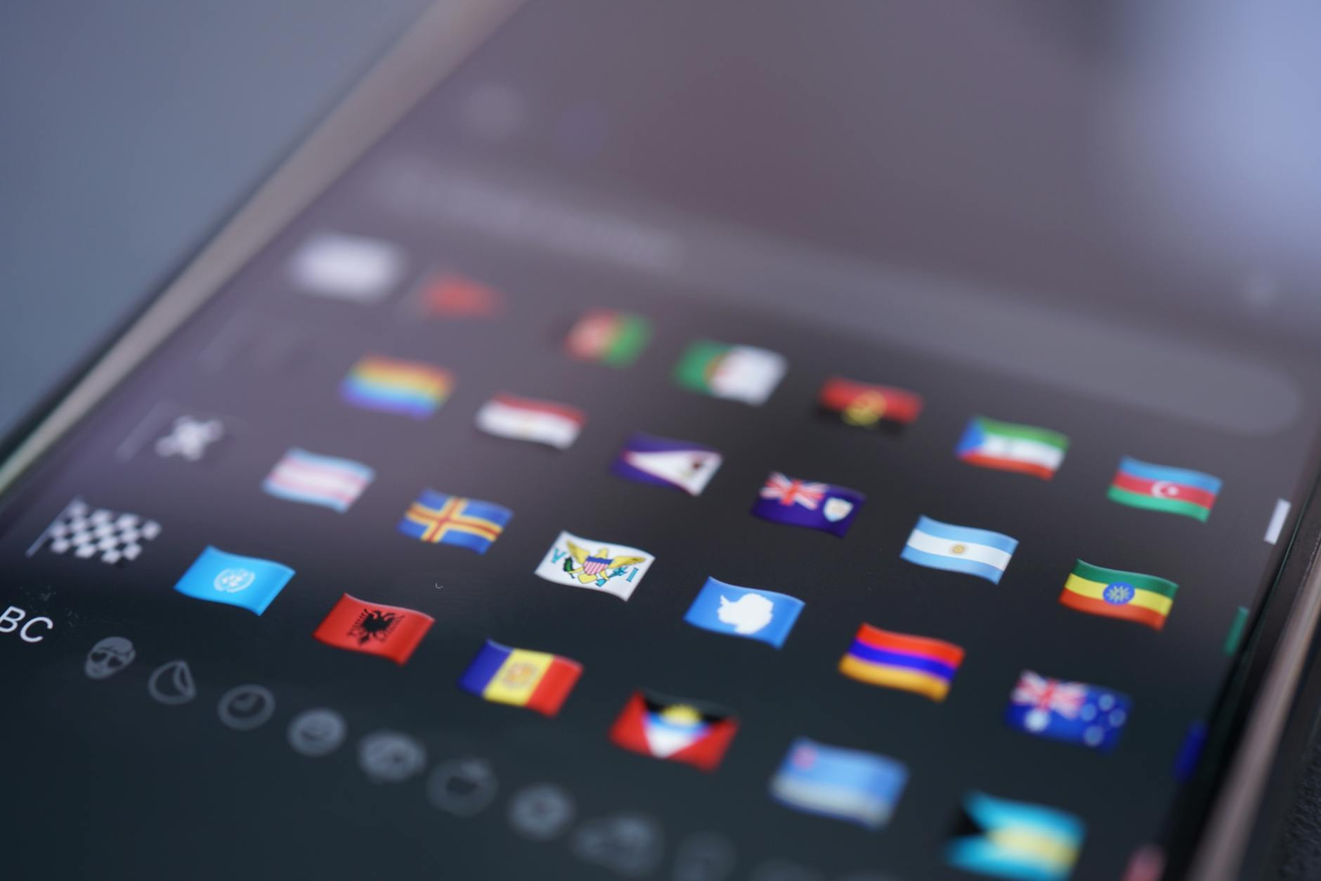 Macro close-up of a smartphone screen, illustrating the cosmetic-grading inspection step.